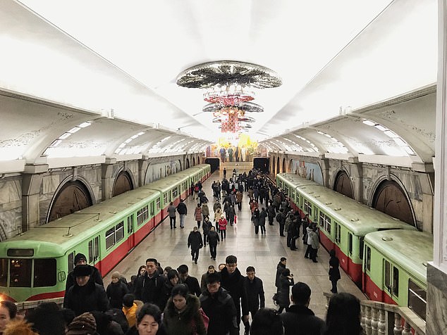 Inside of Pyongyang's neocolassical 100 feet deep metro system - that doubles up as a nuclear bunker