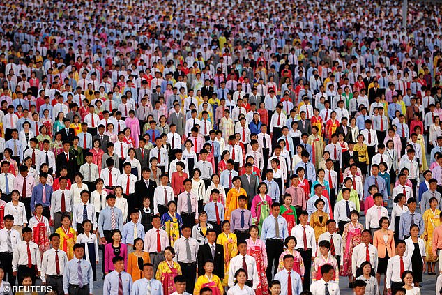 Citizens get ready for a mass dance in the capital's main ceremonial square, May 2016