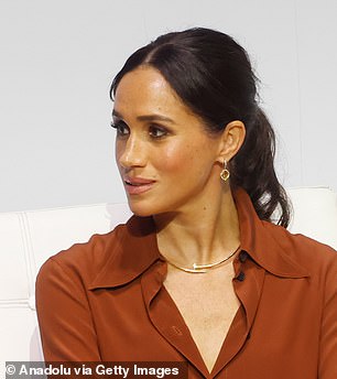 Meghan completed the sophisticated look with a delicate pair of Birks Muse Citrine And Diamond Drop Earrings, which cost a hefty £1964 ($2,530)