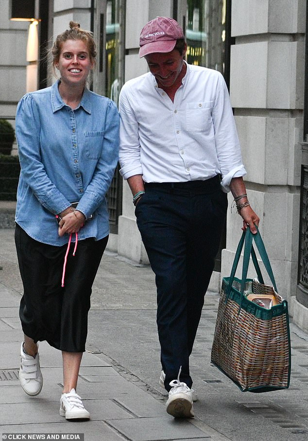 Princess Beatrice was all smiles with her 40-year-old businessman beau as they walked alongside each other in central London