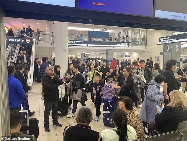 One passenger wrote on social media that many travellers were left standing around at the airport