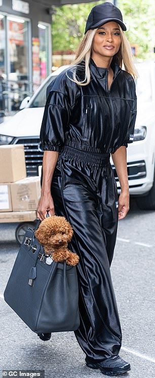 Little Bronco could be seen nestled safely in his mother's arms, or tucked into a bag she kept at her side while strolling around town