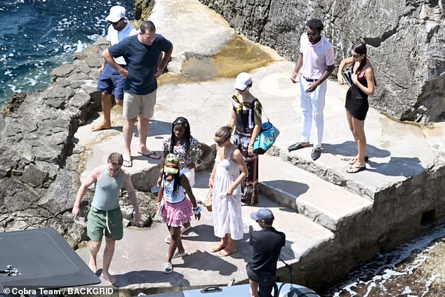 Rocco, her twins Stella and Estere and David appeared to have joined her for the boat ride