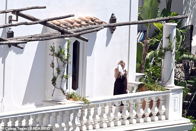 This time, she wore her long blond hair braid-free in waves cascading down her shoulders