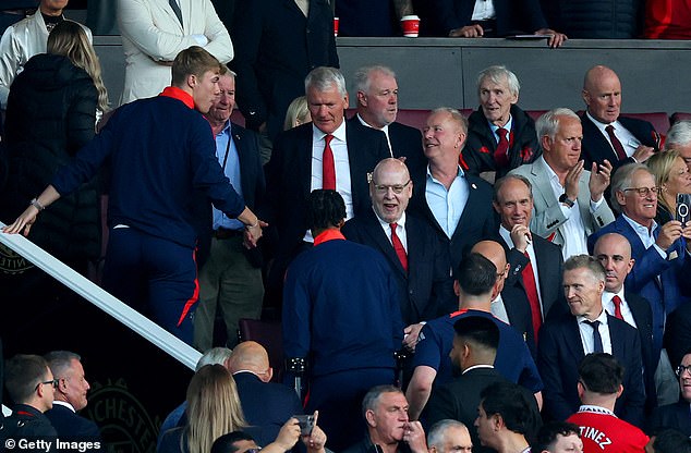 Avram Glazer (centre) made a rare appearance at Old Trafford for the opening match