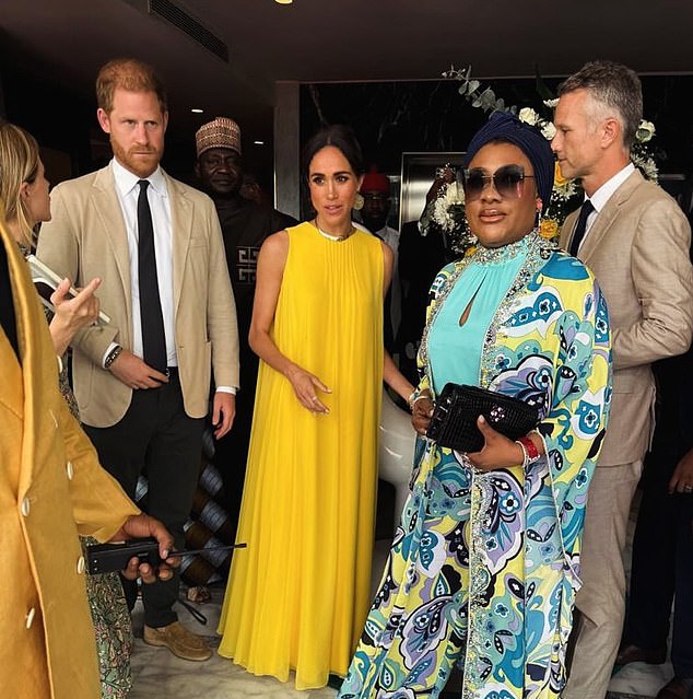 Prince Harry and Meghan with former chief of staff Josh Kettler, right, during a trip to Nigeria