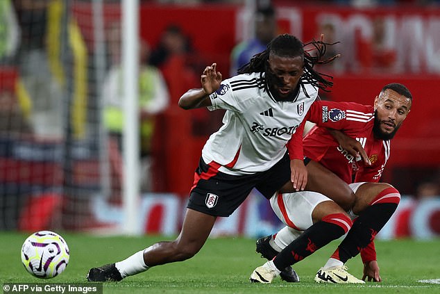 Alex Iwobi (left) struggled to get any chance out of Mazraoui, which made for a frustrating evening