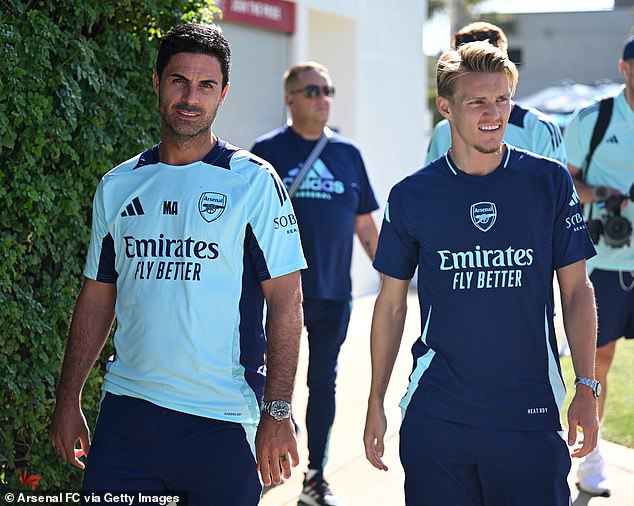 Mikel Arteta (left) hired professional ones to nab his players’ phones and valuables during a team dinner to teach them the importance of staying alert