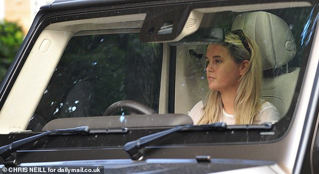 The forlorn TV personality was pictured as she drove her Mercedes-AMG G 63 near her Cheshire home this week for a trip to McDonald's with her friends