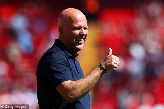 LIVERPOOL, ENGLAND - AUGUST 11: Liverpool manager Arne Slot looks on during the Pre-Season Friendly match between Liverpool and Sevilla at Anfield on August 11, 2024 in Liverpool, England. (Photo by Chris Brunskill/Fantasista/Getty Images)