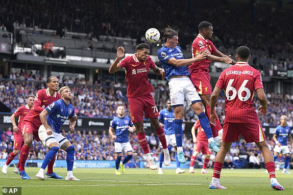 Ipswich Town's Jacob Greaves, third right, competes for the ball with Liverpool's Jarell Quansah, fourth right, during the English Premier League soccer match between Ipswich Town and Liverpool at Portman Road stadium in Ipswich, England, Saturday, Aug. 17, 2024. (AP Photo/Alastair Grant)