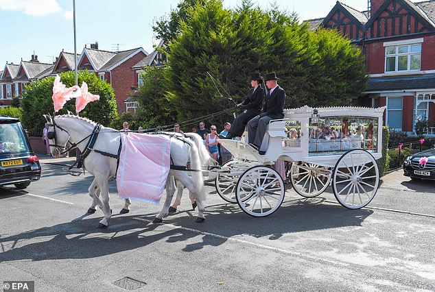 he coffin of Southport attack victim Alice da Silva Aguiar is carried on a carriage after her funeral at St Patrick's Catholic Church in Southport on August 11, 2024