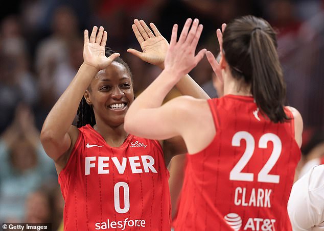 The WNBA rookie set up teammate Kelsey Mitchell (left) during the Fever's victory