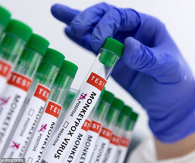 The European Centre for Disease Prevention and Control (ECDC) on Friday raised its risk level for mpox, a day after global health officials confirmed the first infection with a new strain of the virus outside Africa, in Sweden. Pictured: Test tubes labelled 'Monkeypox virus positive and negative'