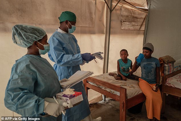 Health workers monitor Mpox patients at the Mpox treatment centre at Nyiragongo General Referral Hospital, north of Goma on August 17, 2024