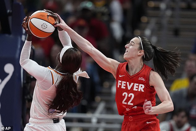 Caitlin Clark fouled Kahleah Copper on a fast break as the Fever beat the Mercury on Friday