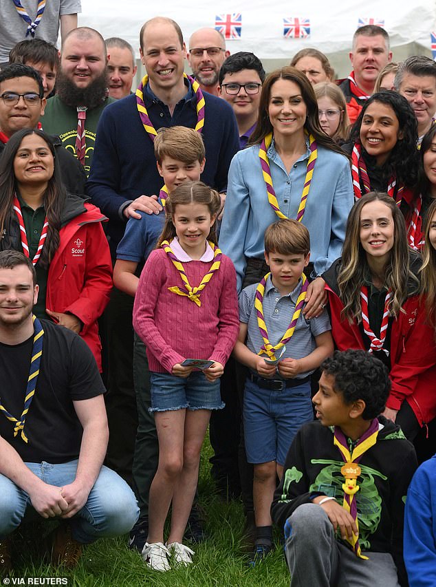 The Royal family had a bit of a rumble last weekend as the Prince and Princess of Wales faced off against their children in a Nerf battle. Pictured are the Waleses last year during a visit to the 3rd Upton Scouts Hut in Slough, west London