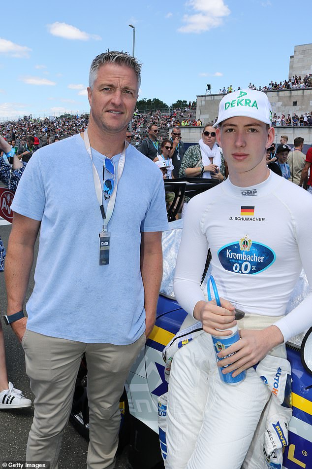 Their son David Schumacher, right, also a racing driver, expressed support for his dad when he came out as gay