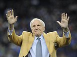 FILE - Detroit Lions head coach Joe Schmidt acknowledges the crowd after receiving a Pro Football Hall of Fame ring during a ceremony at halftime of an NFL football game between the Detroit Lions and the Chicago Bears, Oct. 18, 2015, in Detroit. (AP Photo/Jose Juarez, File)