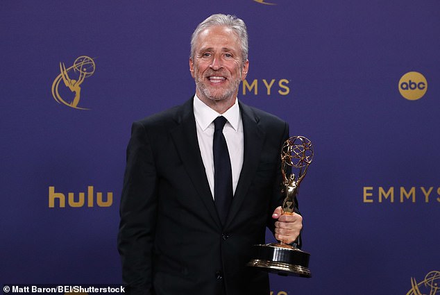 Jon Stewart, pictured at the 2024 Emmy's, urged the country to cool down amid two attempts on former President Donald Trump's life in the past two months