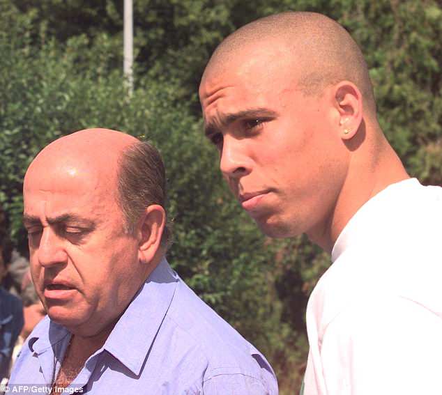 Ronaldo and Brazil doctor Lidio Toledo attended a press conference a day after the 1998 final