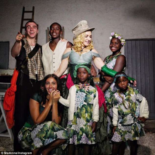 2017 family portrait: The Batuka singer is also mother to daughter Lourdes Leon, 23; son Rocco Ritchie, 19; son David Banda, 14; as well as twin daughters Estere + Stelle, 7