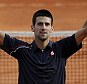 Big winner: Djokovic celebrates his straight sets victory over Federer at Roland Garros