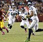 Oct 6, 2014; Landover, MD, USA; Seattle Seahawks quarterback Russell Wilson (3) runs with the ball against the Washington Redskins in the fourth quarter at FedEx Field. The Seahawks won 27-17. Mandatory Credit: Geoff Burke-USA TODAY Sports