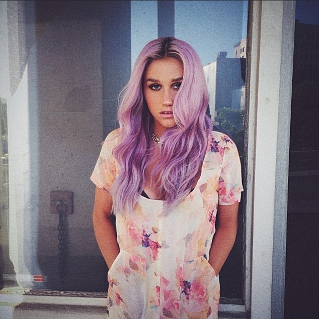 Purple mane: A month before she was rocking lilac locks with with dark roots