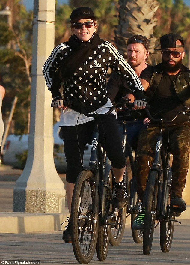 On yer bike! Earlier on Sunday, Madonna hopped onto two wheels for a cycle through Santa Monica