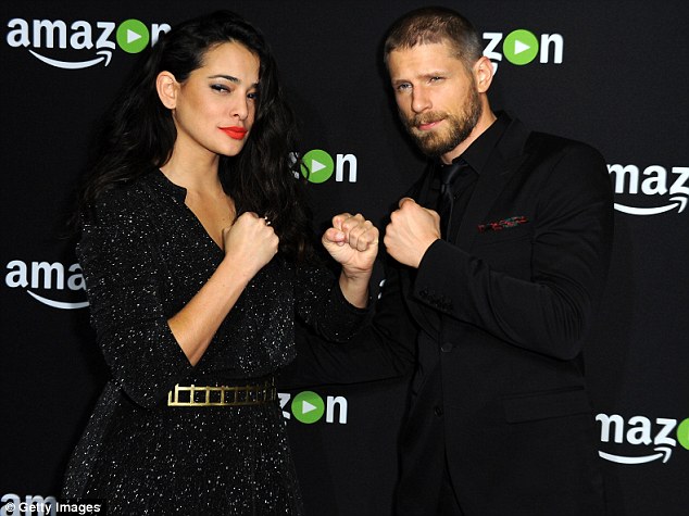 Face off: Natalie Martinez and Matt Lauria played up for the cameras on the red carpet as they joked around together