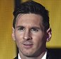 FC Barcelona and Argentina's forward  Lionel Messi holds his trophy after receiving the 2015 FIFA Ballon dOr award for player of the year during the 2015 FIFA Ballon d'Or award ceremony at the Kongresshaus in Zurich on January 11, 2016. AFP PHOTO / OLIVIER MORINOLIVIER MORIN/AFP/Getty Images