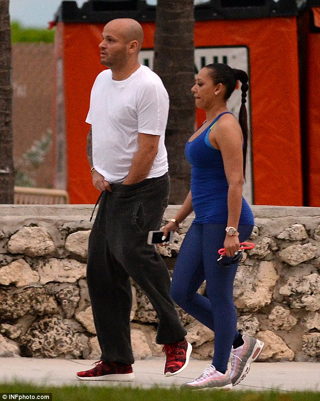 Workout buddies: Cosying up close together, the pair looked loved-up on their romantic stroll. The couple married in 2007 and have one child together, a daughter named Madison