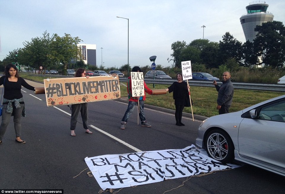 This is the scene near Birmingham airport where demonstrators blocked a main road while chanting slogans