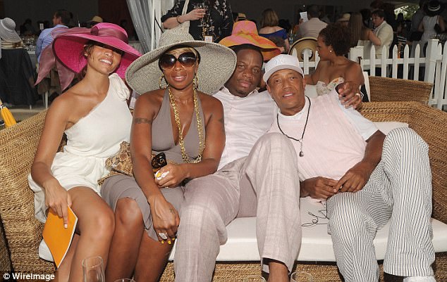 Close: The trio are pictured with Russell Simmons at the Veuve Clicquot Polo Classic on Governors Island on June 27 2010