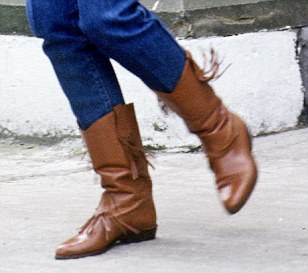 Fringe benefits: Her tasselled boots