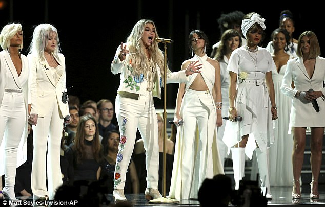 Heartfelt: Kesha battled a very emotional night at the ceremony - having given a passionate  performance of song Praying, about her alleged abuse at the hands of producer Dr Luke