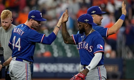 The Texas Rangers celebrate after Game 6 of the AL Championship Series against the Houston Astros