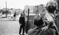 The Berlin Wall, Germany - 1989<br>Mandatory Credit: Photo by Sipa Press / Rex Features ( 165153c ) MAN PEERING OVER THE NEWLY BUILT BERLIN WALL - AUG 1961 The Berlin Wall, Germany - 1989