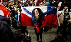 A woman holds a Chilean flag in Valparaiso last year. In a referendum in October, Chileans voted by a 79% landslide majority in favor of a popularly elected citizen assembly with gender parity.