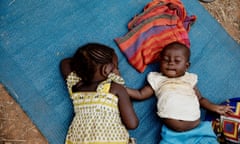 Children sleep in an Internally Displaced Peoples camp in Liton, Central African Republic. Malaria thrives in war-torn regions.