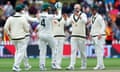 Nathan Lyon and Australia celebrate the wicket of Tom Latham of New Zealand on day three of the first Test