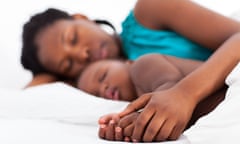 Woman with son asleep