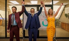 This image released by Netflix shows Chris Evans as Brenner, left, Andy Garcia as Neel, center, and Emily Blunt as Liza in a scene from "Pain Hustlers." (Brian Douglas/Netflix via AP)