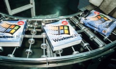 Windows 98 software packages sit on an assembly line