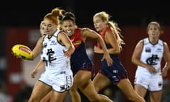 Carlton’s Grace Egan goes in for a kick during their one-point loss to the the Melbourne Demons on Saturday.