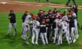 The Arizona Diamondbacks celebrate after beating the Phillies in Game 7 to claim the National League pennant.