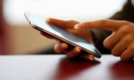 Woman holding large smartphone