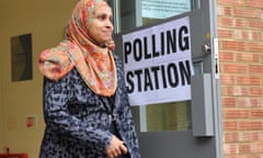 A woman leaves a polling station in Luton at the May 2015 general election.