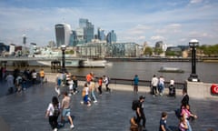 The City of London skyline is seen from across the river Thames